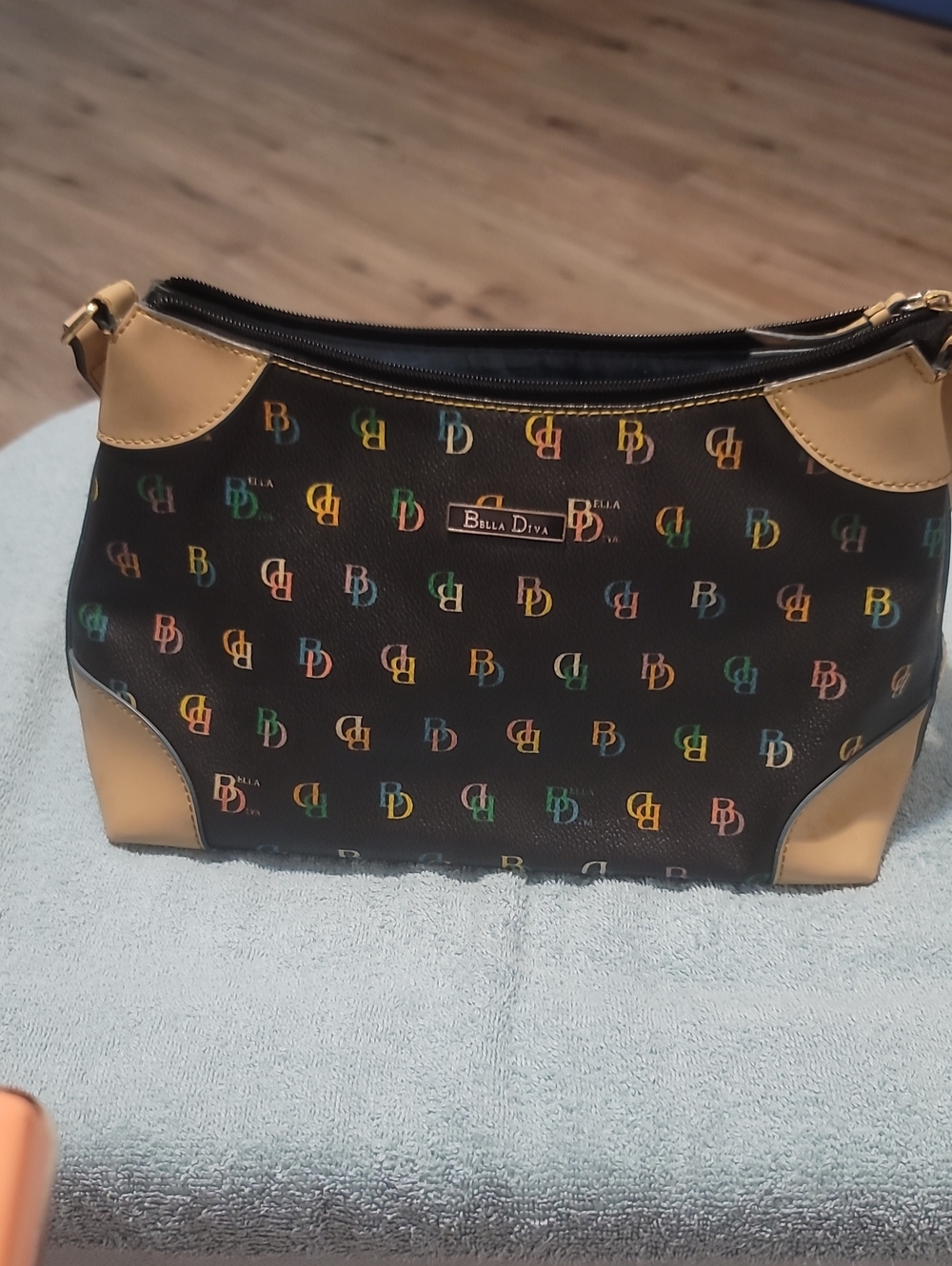 Bella D. Black Shoulder Bag with Multicolor Logo and Tan Accents